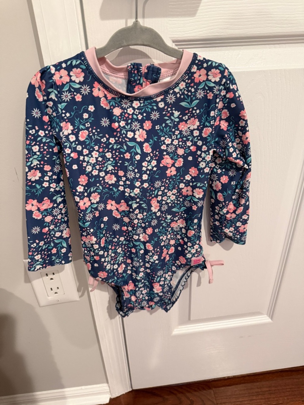 Ruffle Butts Navy Floral Long-Sleeve Rash Guard Swimsuit with Pink Trim